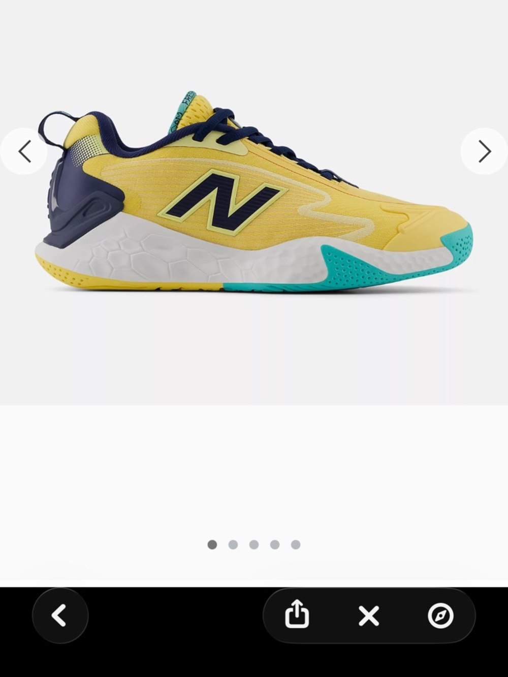 New Balance Yellow, teal & navy tennis shoes.  Size is 8 1/2 wide.